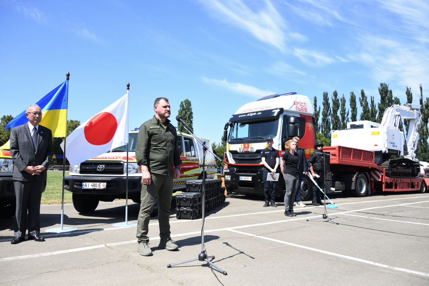 The Ukrainian Interior Minister Klymenko center gives an address in front of a landmine removal vehicle provided by Japan (outside Kyiv Ukraine) 09/07/2024.